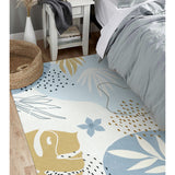 Covaba modern botanical leaf area rug in stormy blue, shown flat on a plain ivory backdrop, view 3