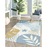 Covaba modern botanical leaf area rug in stormy blue, shown flat on a plain ivory backdrop, view 2