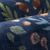 Covaba boho insect botanical floral rug in stormy blue, styled in a room setting