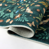 Covaba boho insect botanical floral rug in forest fern, styled in a room setting