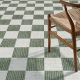 Covaba modern checkerboard rug in olive grove, styled in a room setting, view 2