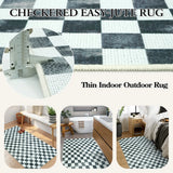 Covaba check soft easy jute black/white indoor/outdoor rug in soft white, styled in a room setting, view 2