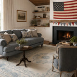 Covaba vintage traditional floral area rug in stormy blue, styled in a room setting, view 11