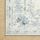 Covaba vintage traditional floral area rug in stormy blue, styled in a room setting, view 10