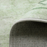 Covaba vintage traditional floral area rug in fern green, styled in a room setting, view 10