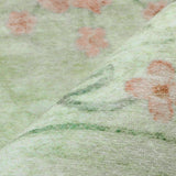 Covaba vintage traditional floral area rug in fern green, styled in a room setting, view 5