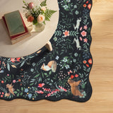 Covaba maximalist unicorn garden scalloped area rug in ink black, styled in a room setting, view 9