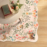 Covaba maximalist unicorn garden scalloped area rug in blush clay, styled in a room setting, view 7