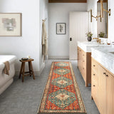 Covaba boho vintage tribal runner rug in burnt rust, styled in a room setting, view 11
