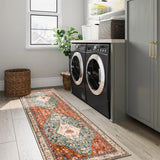 Covaba boho vintage tribal runner rug in burnt rust, styled in a room setting, view 3