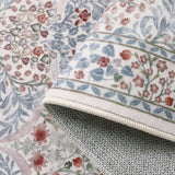 Covaba maximalism vintage french floral rug in warm beige, styled in a room setting