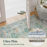 Covaba maximalism vintage french floral rug in sage mist, styled in a room setting