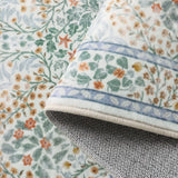 Covaba maximalism vintage french floral rug in sage mist, styled in a room setting, view 2