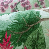 Covaba jungle botanical spring rug in fern green, styled in a room setting, view 2