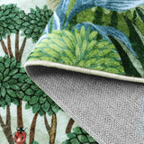 Covaba jungle tropical summer rug in fern green, styled in a room setting