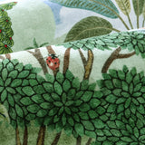 Covaba jungle tropical summer rug in fern green, styled in a room setting, view 2
