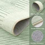 Covaba modern minimalist line rug in fern green, styled in a room setting, view 2