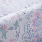 Covaba vintage persian floral rug in muted plum, styled in a room setting