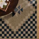 Covaba tribal soft easy jute indoor/outdoor rug in ink black, styled in a room setting, view 3