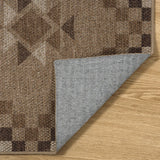 Covaba tribal soft easy jute tan indoor/outdoor rug in multicolor, styled in a room setting