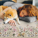 Covaba modern blooming floral garden rug in warm beige, styled in a room setting, view 2