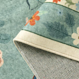 Covaba modern parisian insect rug in sage mist, styled in a room setting, view 2