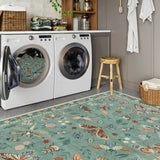 Covaba modern parisian insect rug in sage mist, styled in a room setting