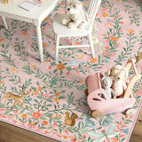 Covaba fantasy garden and unicorn rug in blush clay, styled in a room setting, view 2