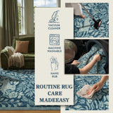 Covaba vintage woodcut forest and rabbit rug in stormy blue, styled in a room setting, view 4