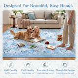 Covaba romantic vintage floral rose garden rug in stormy blue, shown flat on a plain ivory backdrop, view 2