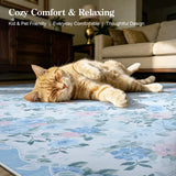 Covaba romantic vintage floral rose garden rug in stormy blue, styled in a room setting