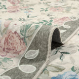 Covaba romantic vintage floral rose garden rug in sage mist, styled in a room setting