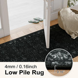 Covaba vintage persian distressed rug in ink black, styled in a room setting, view 9
