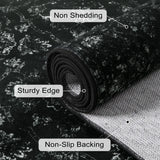 Covaba vintage persian distressed rug in ink black, styled in a room setting, view 2