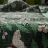 Covaba vintage botanical floral rug in fern green, styled in a room setting