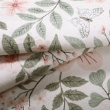 Covaba vintage botanical floral rug in blush clay, styled in a room setting