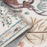 Covaba jungle animals rug in warm beige, styled in a room setting