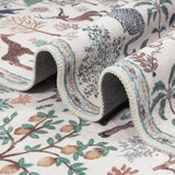 Covaba jungle animals rug in warm beige, styled in a room setting, view 2