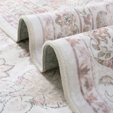 Covaba vintage persian rug in blush clay, styled in a room setting, view 2