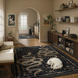 Covaba mystical snake area rug in ink black, styled in a room setting, view 2