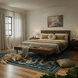 Covaba mystical snake rug in stormy blue, styled in a room setting