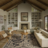 Covaba mystical snake rug in coffee brown, styled in a room setting, view 5