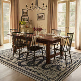 Covaba mystical snake rug in coffee brown, styled in a room setting, view 3