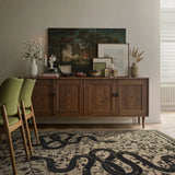 Covaba mystical snake rug in coffee brown, styled in a room setting, view 4