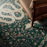 Covaba mystical snake - size deal rug in fern green, styled in a room setting