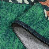 Covaba aesthetic tiger rug in fern green, styled in a room setting, view 2
