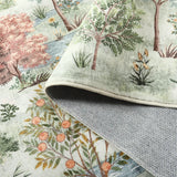 Covaba forest woodland rug in sage mist, styled in a room setting, view 2