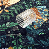 Covaba vintage botanical insect rug in stormy blue, styled in a room setting, view 3