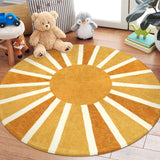 Covaba boho rainbow sunshine round rug in amber clay, styled in a room setting, view 5