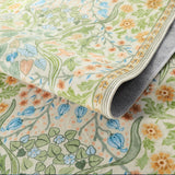 Covaba maximalism vibrant floral rug in sage mist, styled in a room setting, view 2